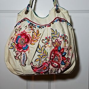 Accessorize bag with beaded beautiful design